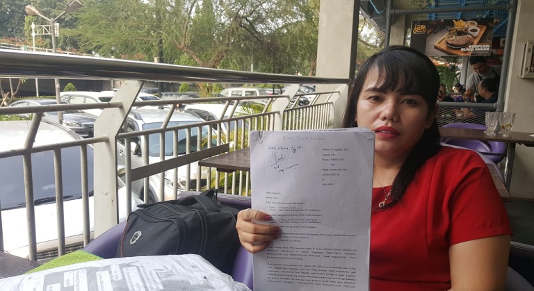 Diberhentikan dari PNS, Dokter Pina Pakpahan Minta Keadilan Presiden Jokowi