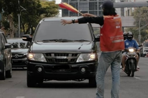 
                                       Cuma Lima Bulan Gabung Ormas, Pria Ini Sudah Dapat Rp7 Juta dari Jaga Parkiran Ilegal per Bulan